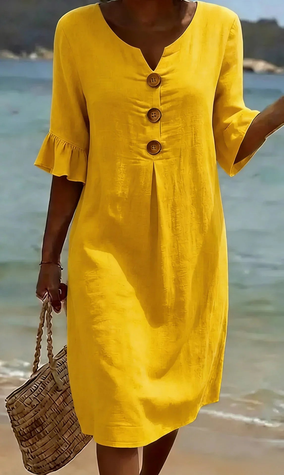 Bárbara | Vestido con textura de lino, manga abullonada y botones