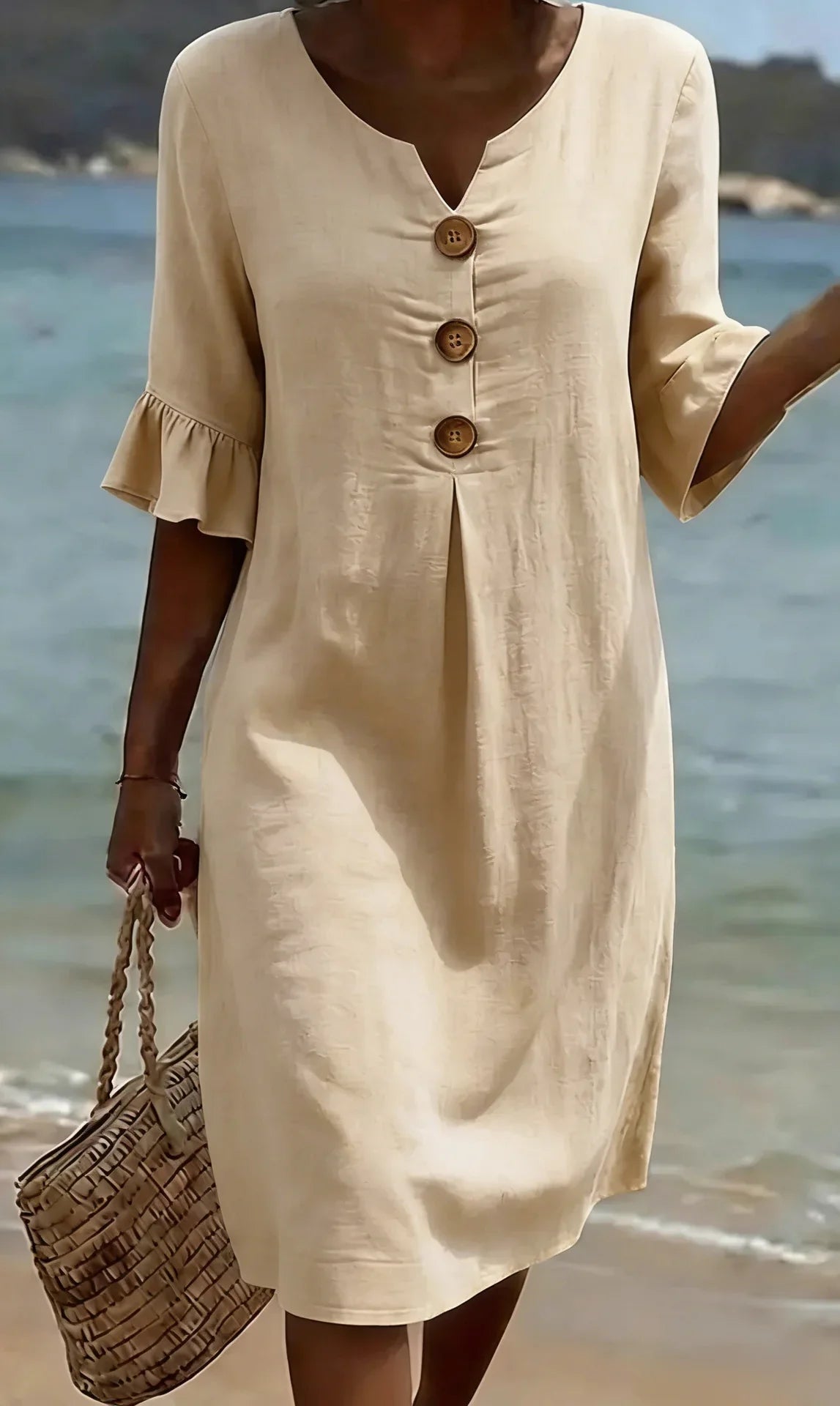Bárbara | Vestido con textura de lino, manga abullonada y botones