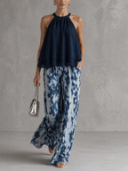 Olimpia | Elegante conjunto con top sin mangas y pantalones anchos estampados