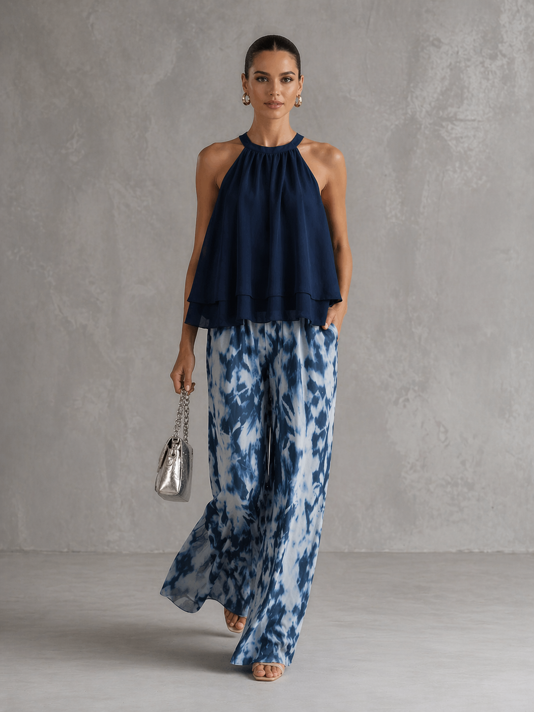Olimpia | Elegante conjunto con top sin mangas y pantalones anchos estampados