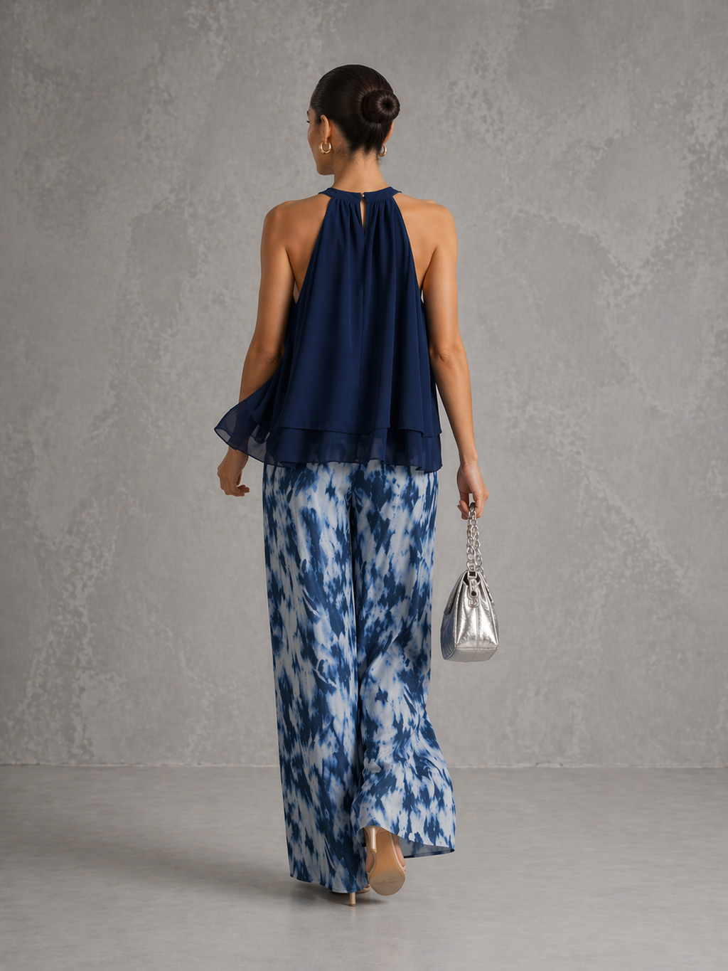 Olimpia | Elegante conjunto con top sin mangas y pantalones anchos estampados