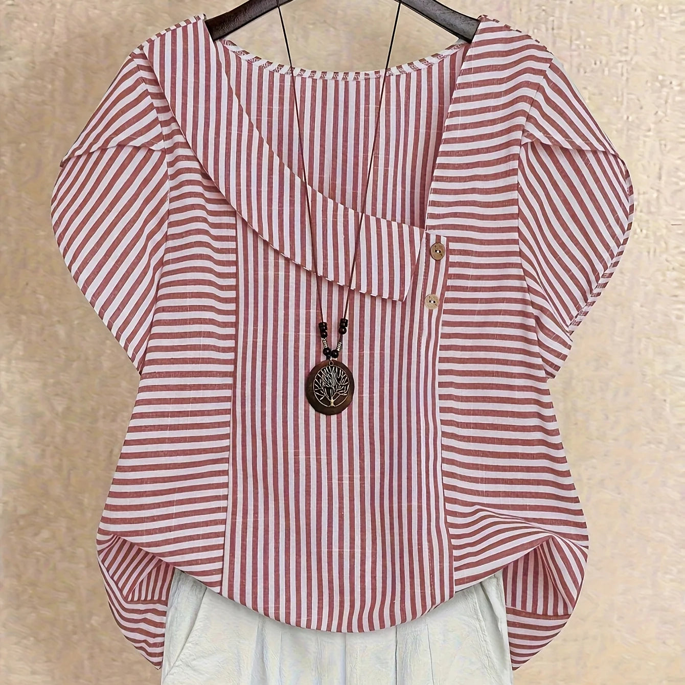 Iria | Blusa de Rayas Azul con Escote Asimétrico y Botones Decorativos