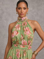 Flor | Vestido largo verde con estampado floral de gasa y cuello halter